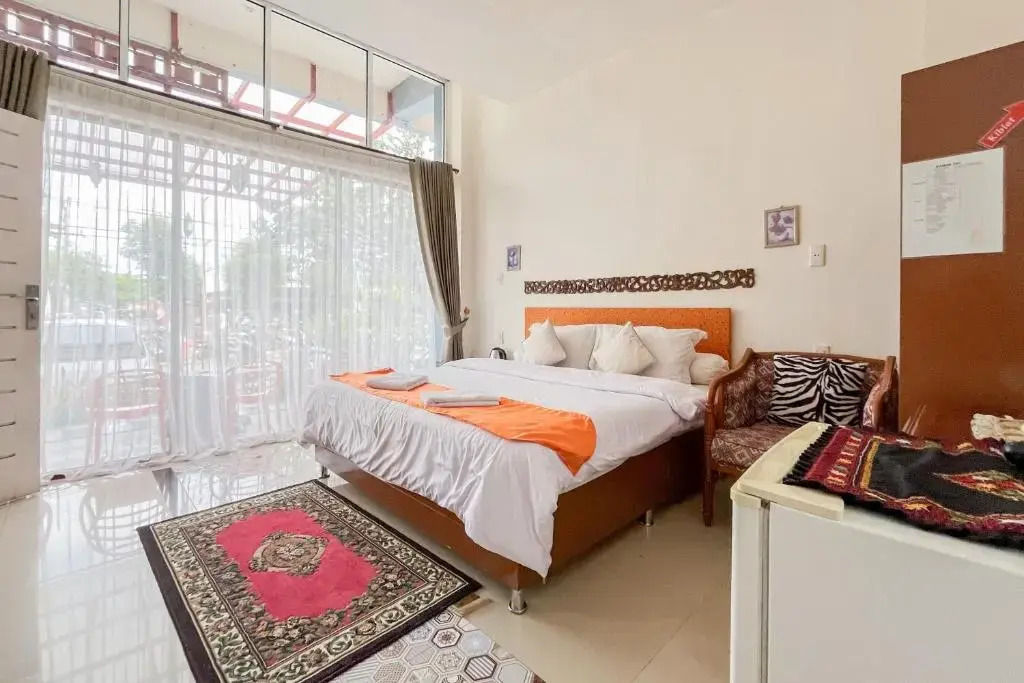 Urbanview Poma Hotel