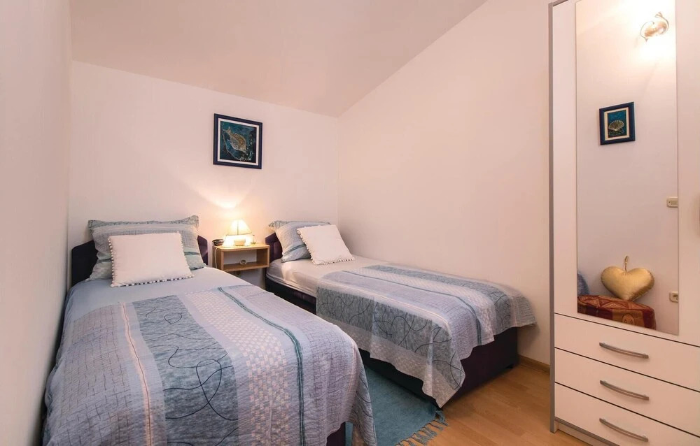 Nice Home in Kastel Novi With Sauna, Wifi and 4 Bedrooms