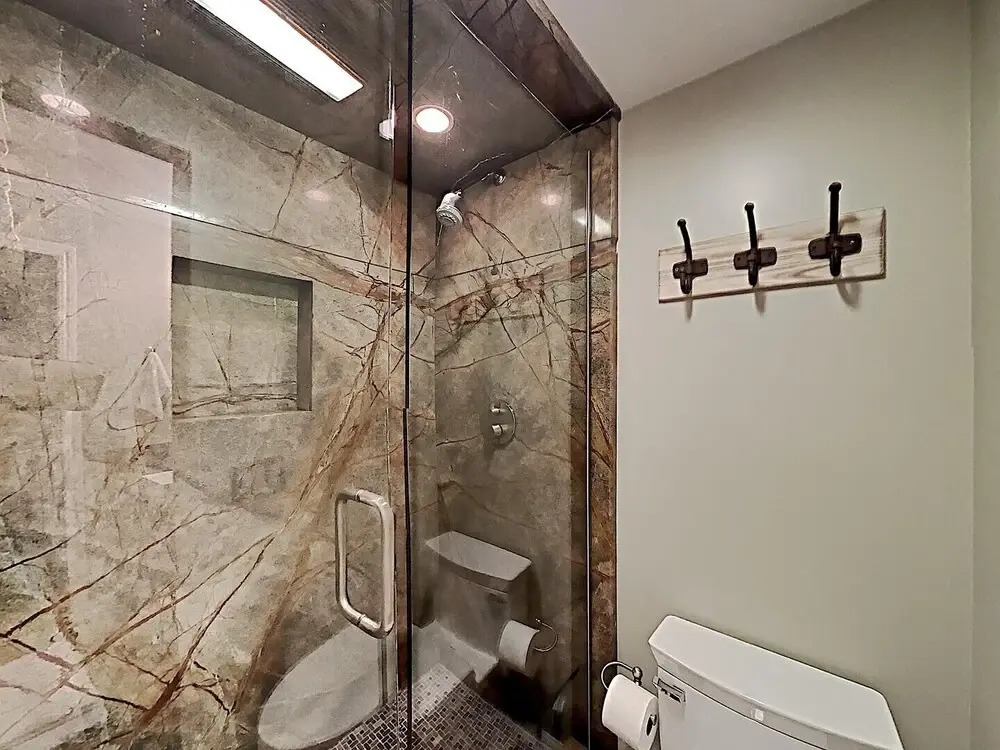 DELUXE SLOPESIDE Condo with 4th FLOOR VIEWS, Elevator and Underground Parking at Canyon Lodge (1849 Condos 409) by RedAwning