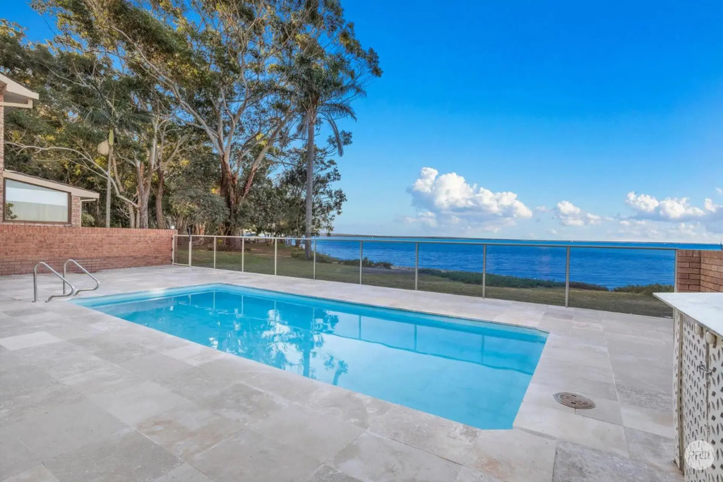 Seaside Sanctuary - Waterfront Luxury Home with Heated Pool