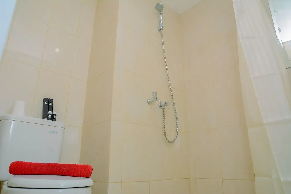 New Furnsihed Studio Room Apartment at Springlake Bekasi By Travelio
