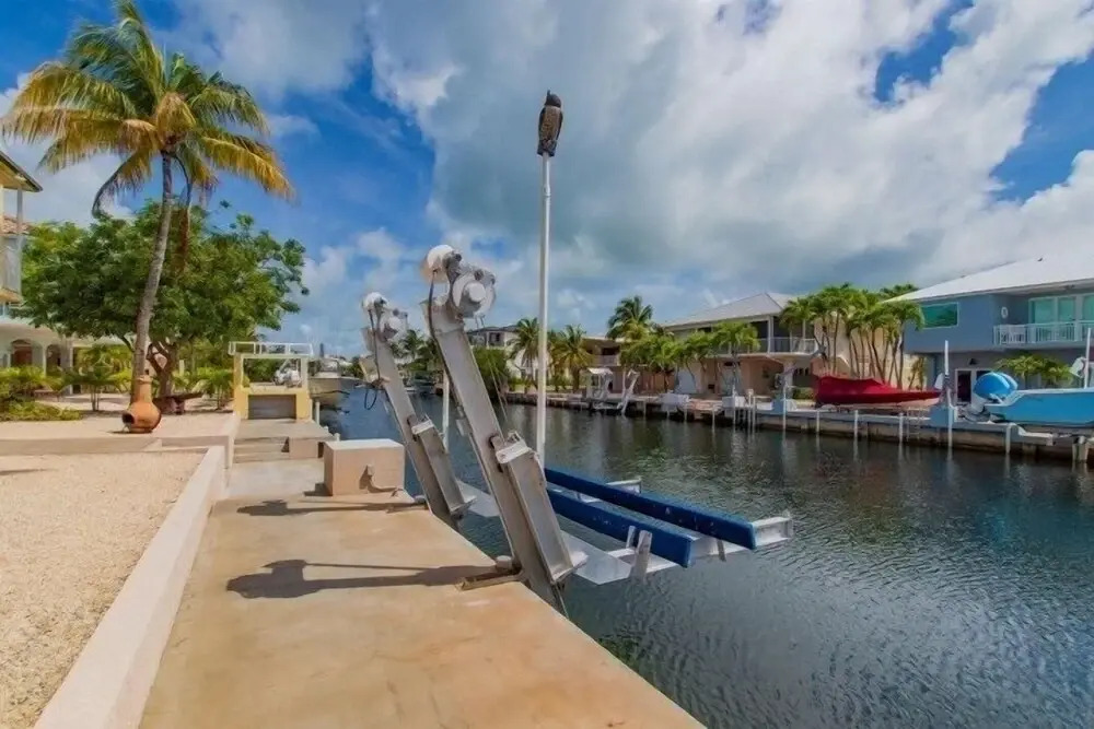 Beautiful House Located In The Prestigious Neighborhood Of Port Antigua On A Deep, Wide Canal. 4 Bedroom Home by RedAwning