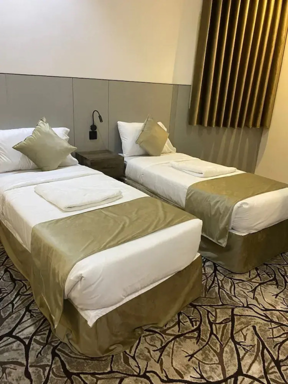 Al Raqui Al Mumaiaz Hotel