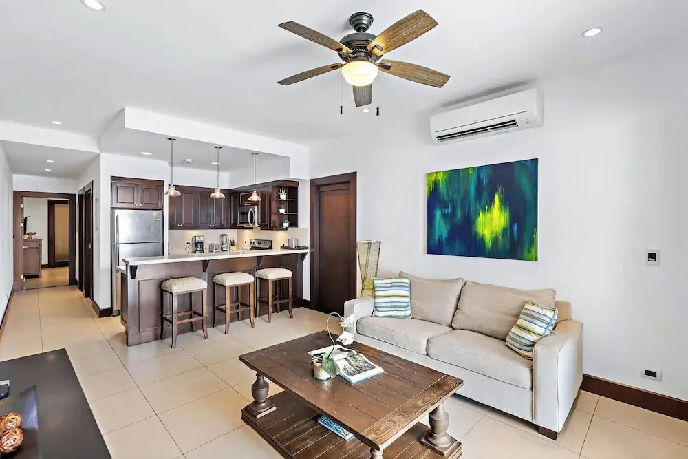 Luxury Condo with Panoramic Ocean Views, Sparkling Infinity Pool, and Modern Open-Concept Design