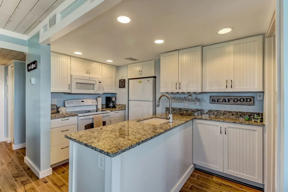 Newly Remodeled Oceanfront Condo with Salt Water Pool and Private Walkway to Beach by RedAwning