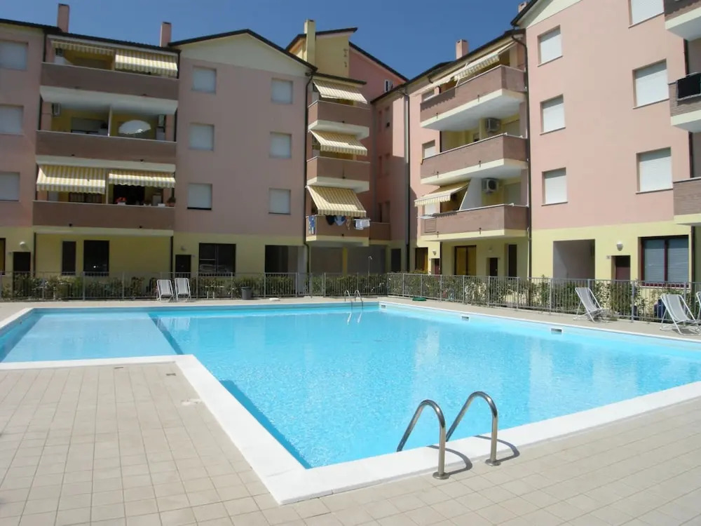 Apartment With Pool Near the Beach