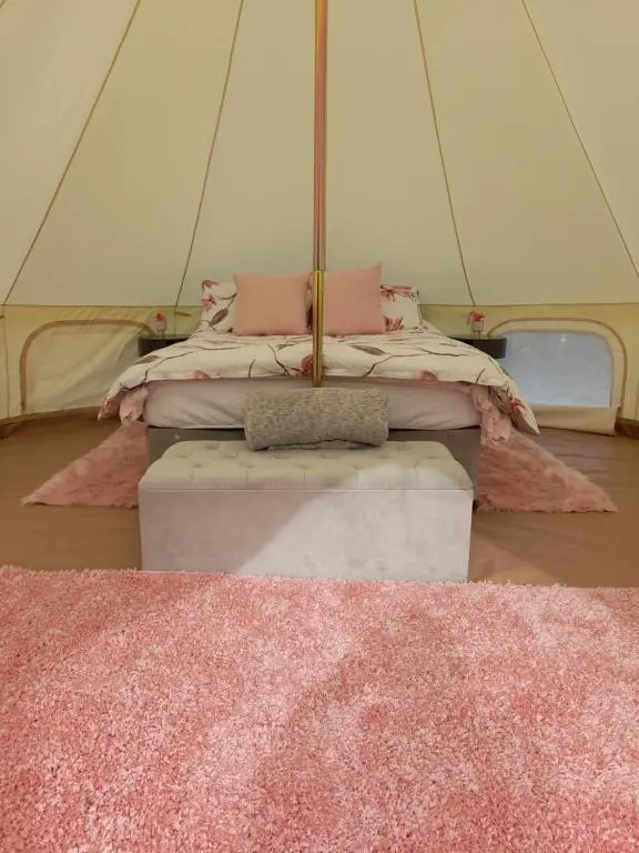 Log cabin retreat and luxury bell tent