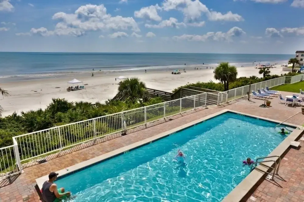 Surf And Racquet 101 3 Bedroom Condo by RedAwning