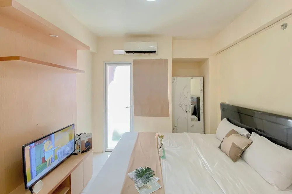 Good Choice Studio at Green Pramuka Apartment near Shopping Center By Travelio