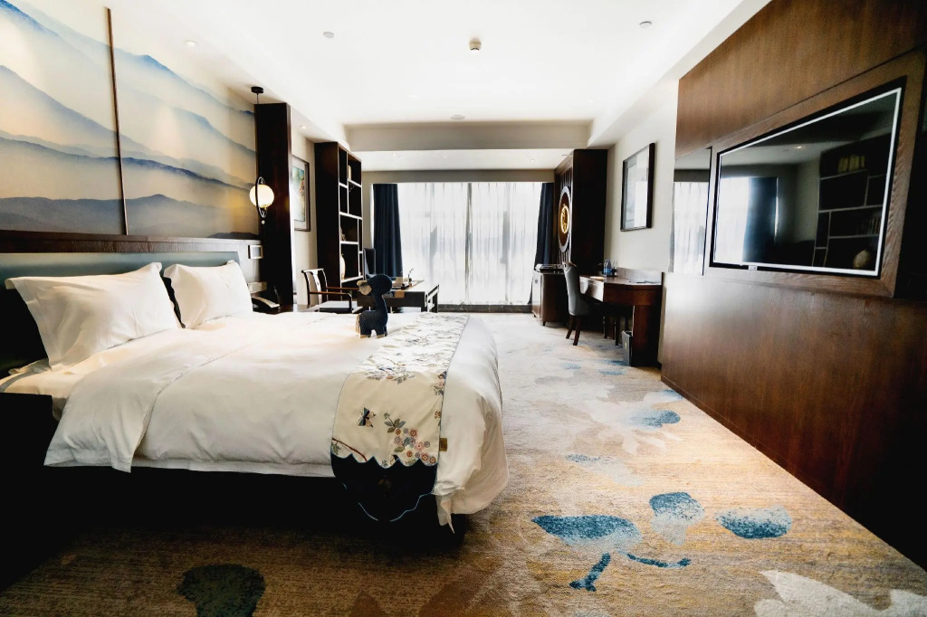 Tang Xiao-Zhu · Tangshan Feast Cultural and Tourism Hotel