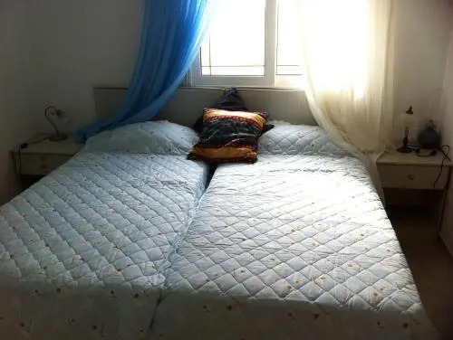 Family Apartment Ammoudi with shared mini-pool