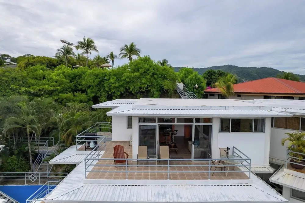 Modern Top-Floor Condo with Panoramic Views and Community Pool