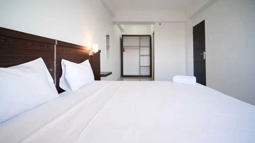 Simple 2Br With Extra Bed At Menara Rungkut Apartment