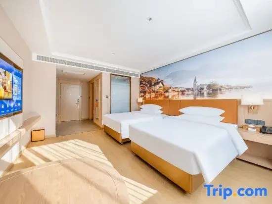 Vienna Hotel (Yuxi Xinping Gasa Flower Street)