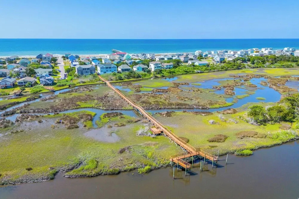 Walk to Beach: Oak Island Retreat w/ 210-yard Dock
