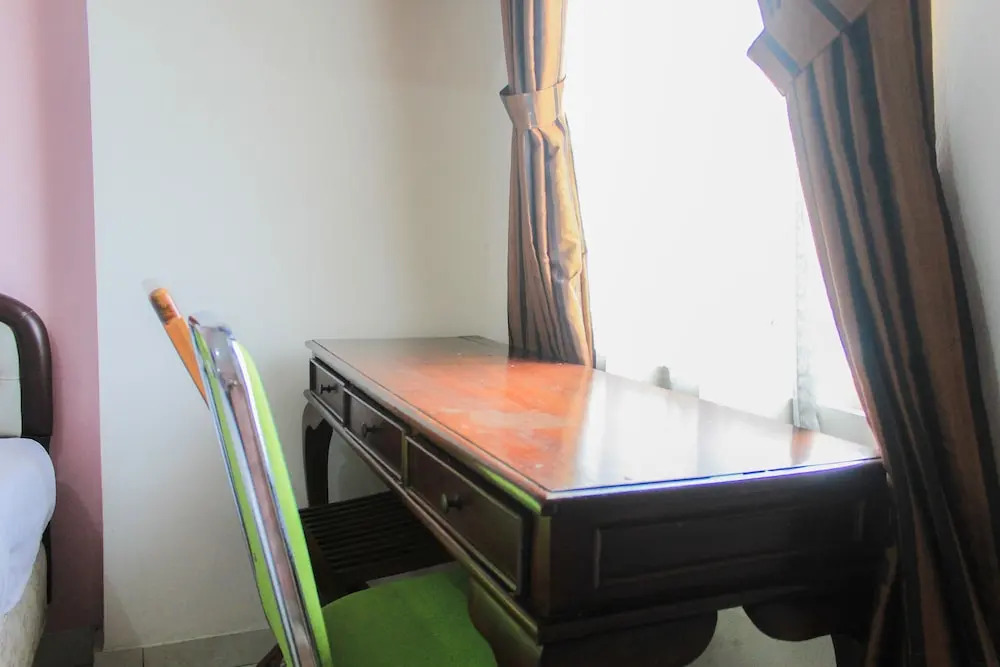 Homey and Cozy Living Studio at Margonda Residence 2 Apartment