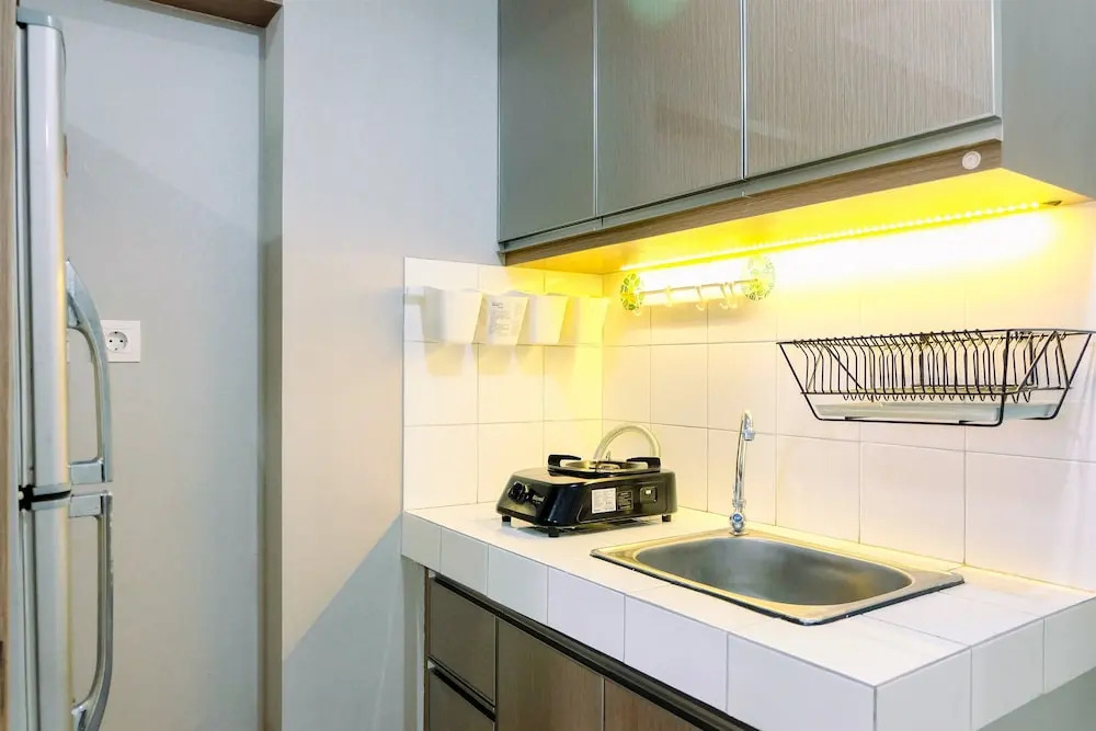 Homey 2BR with Pool View Apartment @ Springlake Summarecon By Travelio