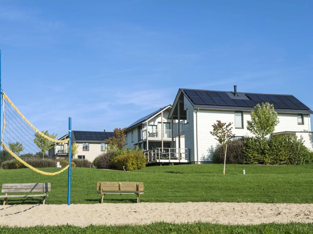 Child-friendly villa with stove, located in a lake area