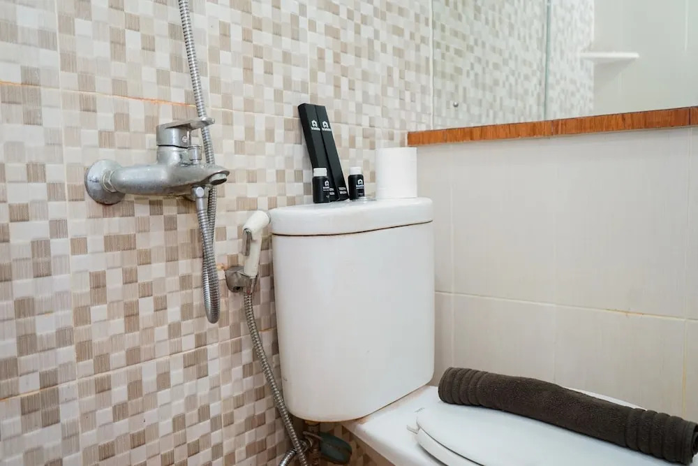 Homey 1BR with City View at Green Pramuka Apartment By Travelio