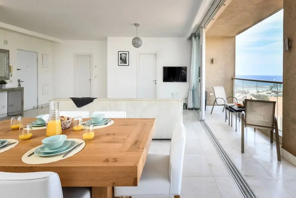 Modern Gem with Stunning Balcony by Sea N Rent