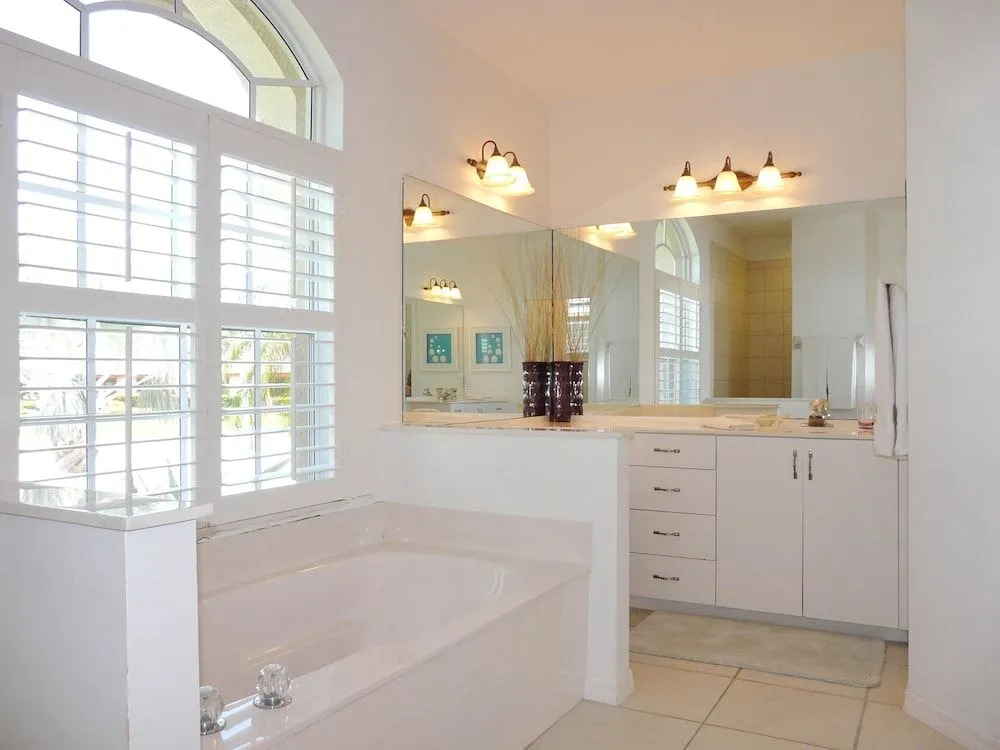 Waterfront home with views, pool and walk to beach