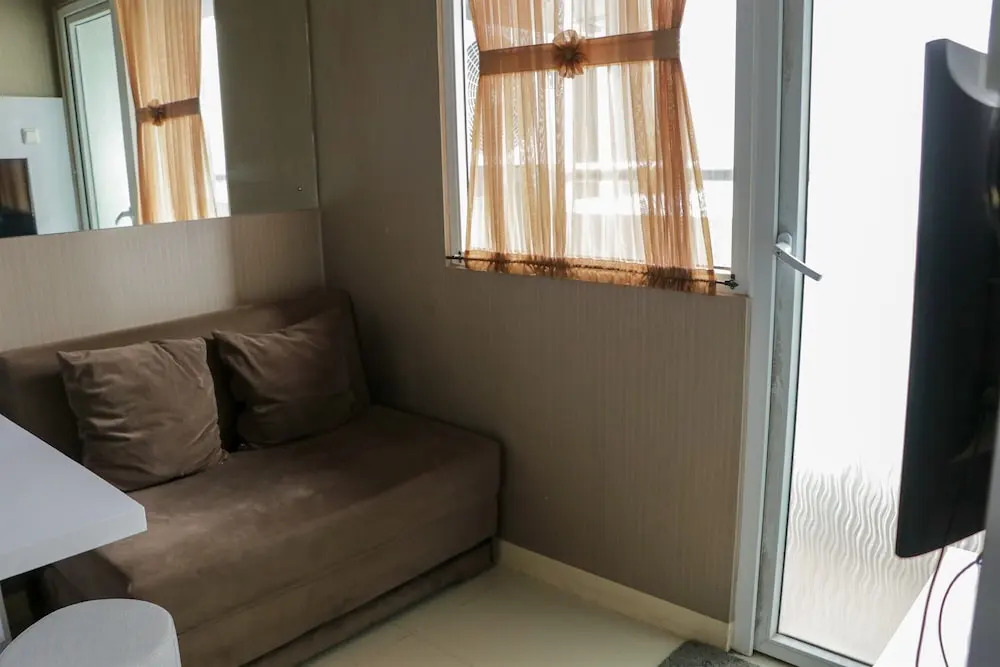 Homey And Cozy Stay 2Br At Green Pramuka City Apartment