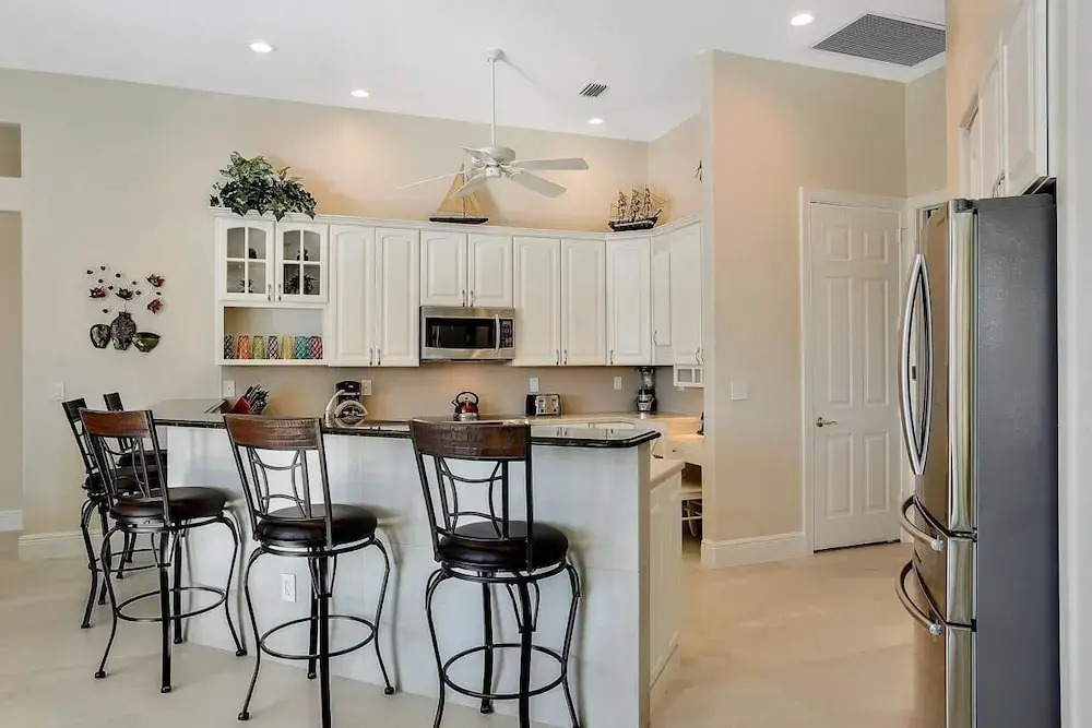 Waterfront home with pool, spa and walk to beach