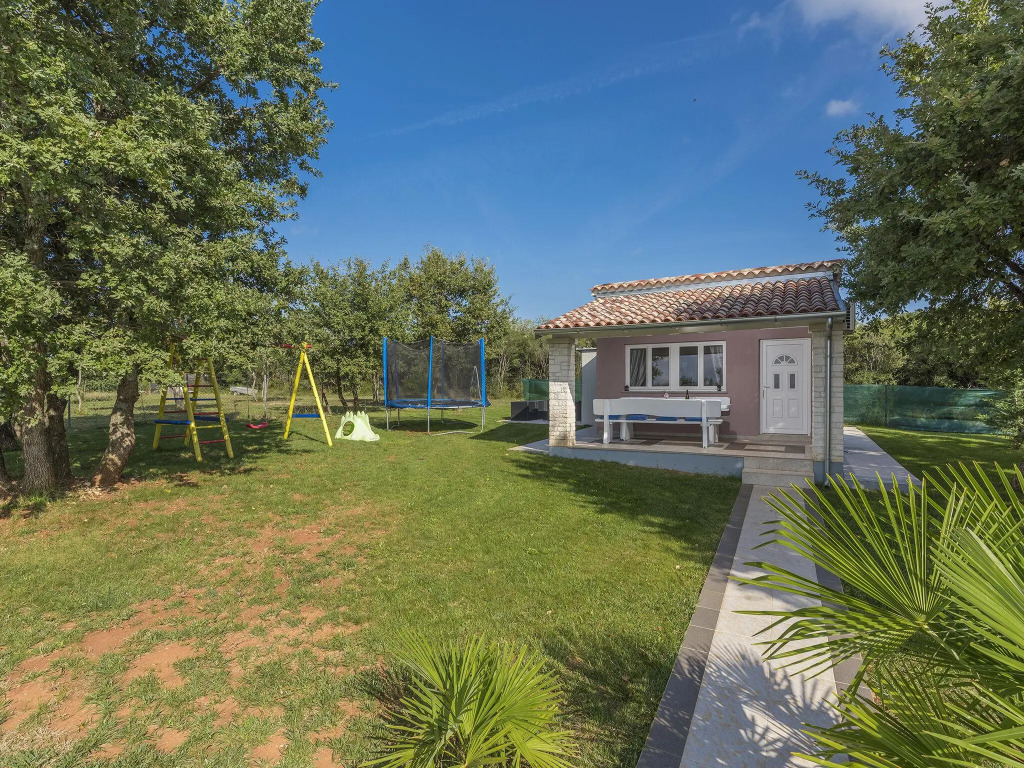 Holiday House with pool, garden, playground and BBQ - surrounded by nature