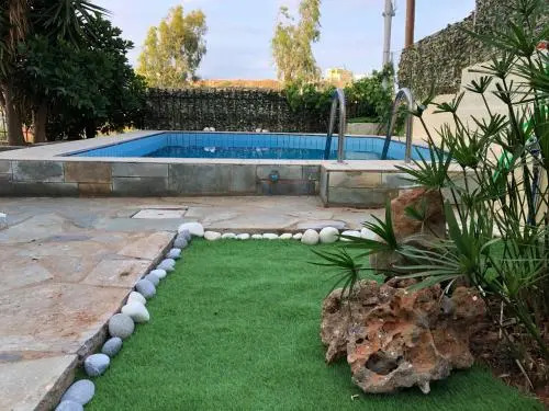 Family Apartment Ammoudi with shared mini-pool
