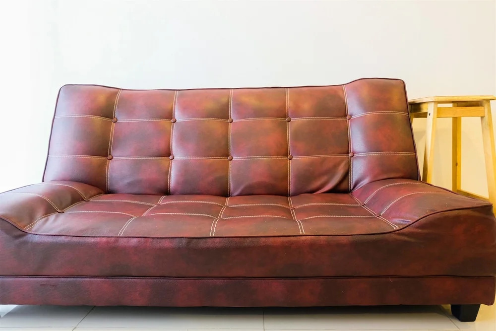 1BR Apartment with Sofa Bed at The H Residence