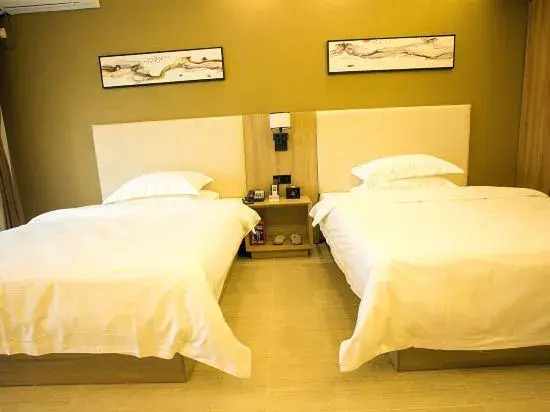 Yuexi Boutique Hotel (Xinyang East Railway Station Evergrande Plaza)