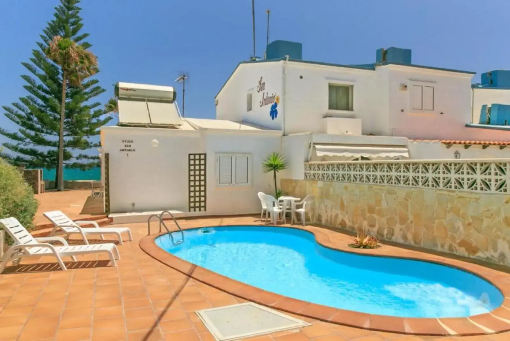Beachfront Villa San Antonio with Private Heated Pool BBQ in the Heart of Corralejo by Amazzzing Travel