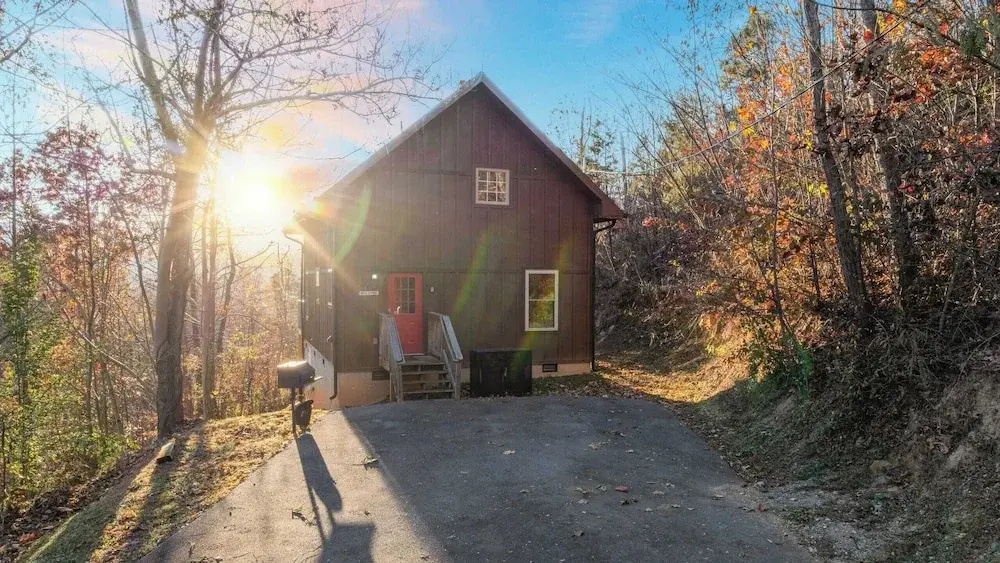 Hot Tub, Game Loft, Open Living, Minutes to Downtown Gatlinburg Whisper Cabin by Avantstay