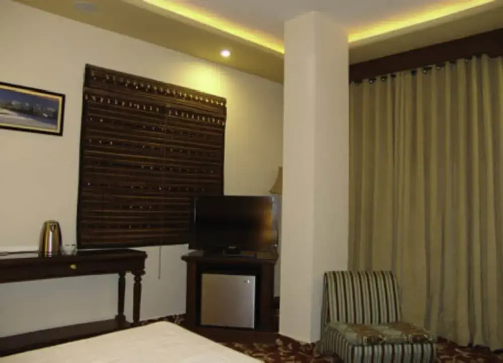 Raj One Hotel