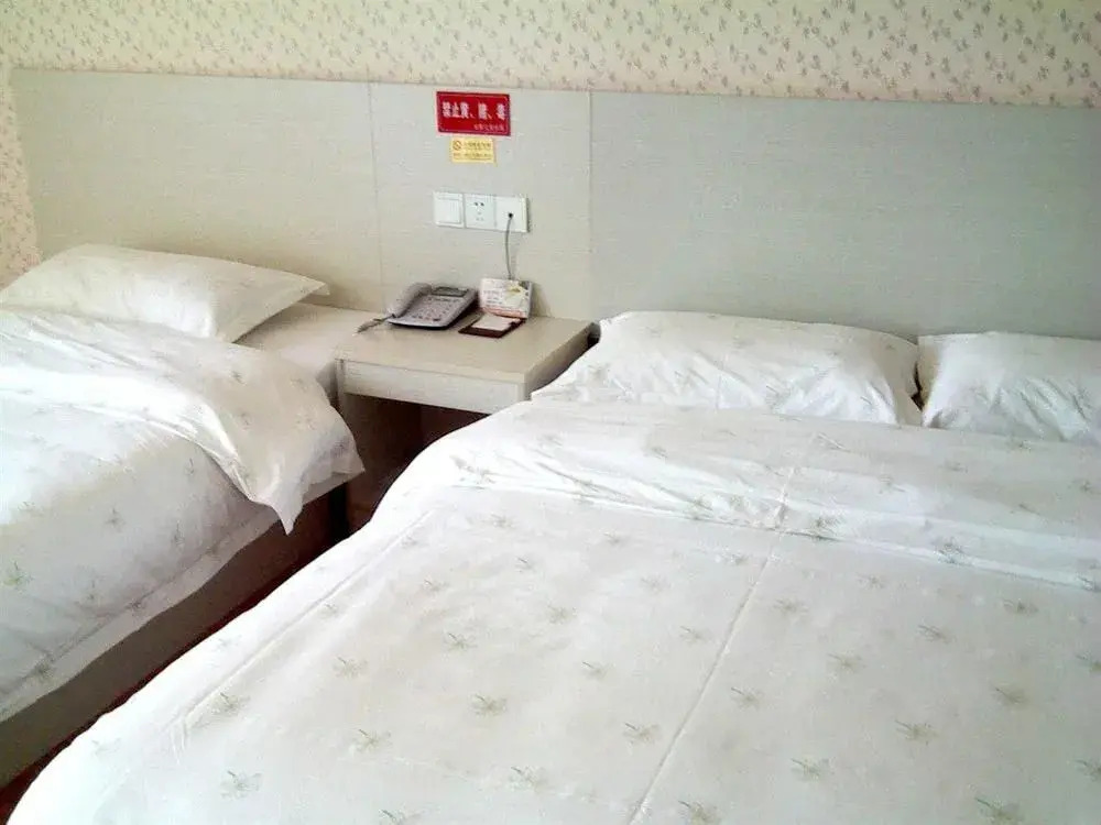 Lily Holiday Hotel (Yichang East Railway Station Fujiuyuan Xintiandi Branch)(百合假日酒店(宜昌东站店))