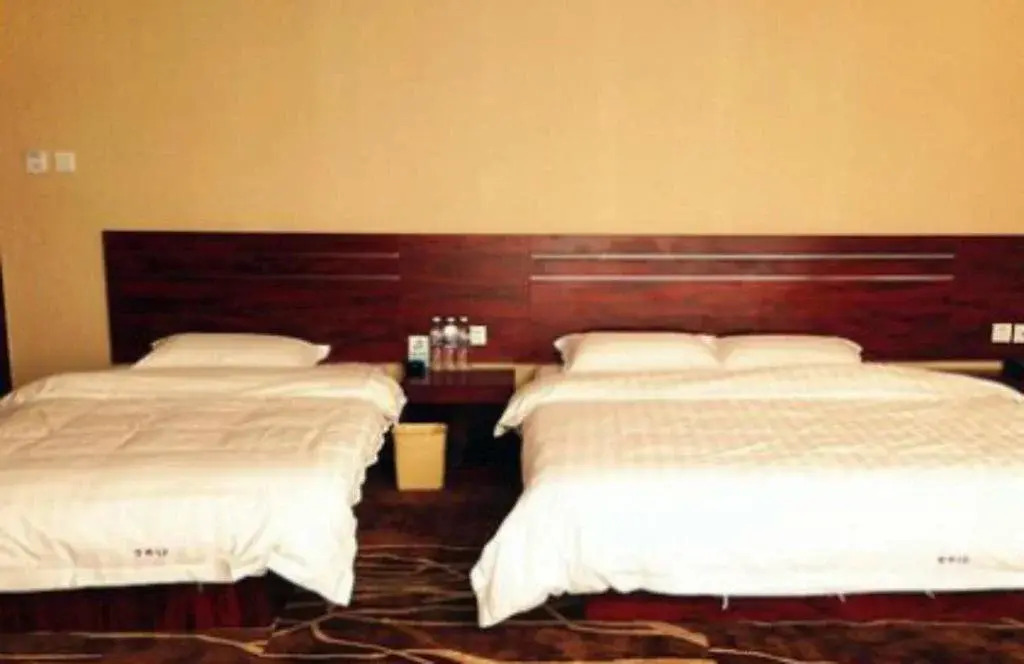 Wanlong Business Hotel