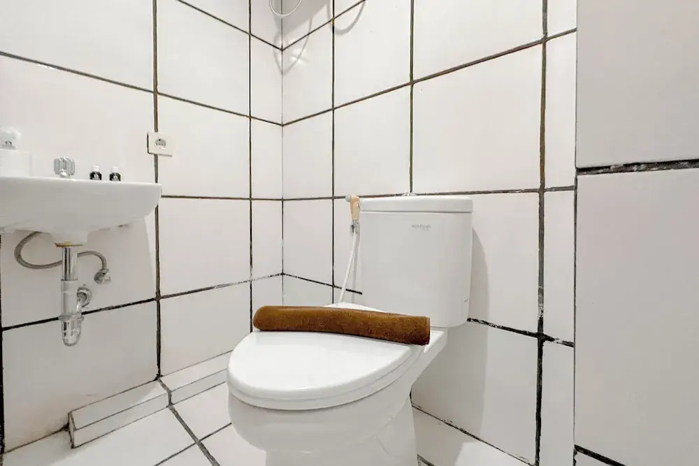 Combined Grey Toned 2Br Apartment At The City Square Surabaya