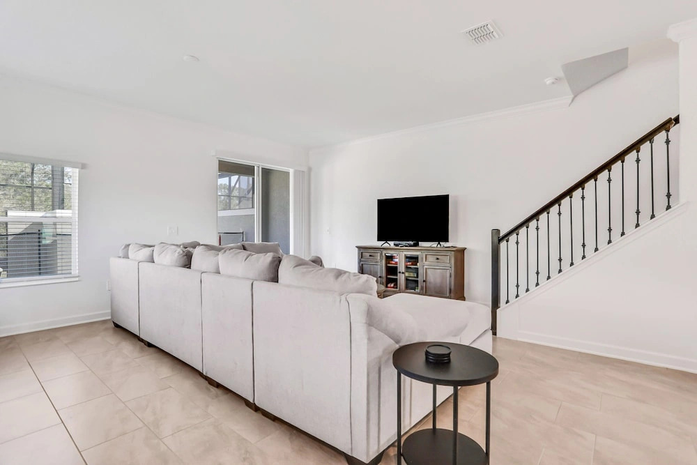Updated Townhome With an Enclosed Pool, Five Bedrooms, W/D - Close to Everything