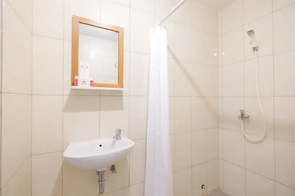 Spacious 2 Bedroom at Bassura City Apartment By Travelio