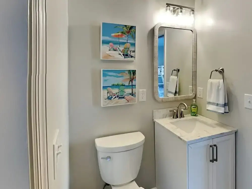 Blue Me A Wave by Topsail Realty