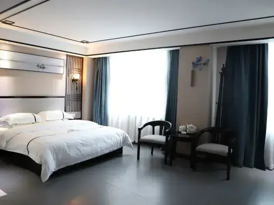 Xinhai Hotel Zhecheng