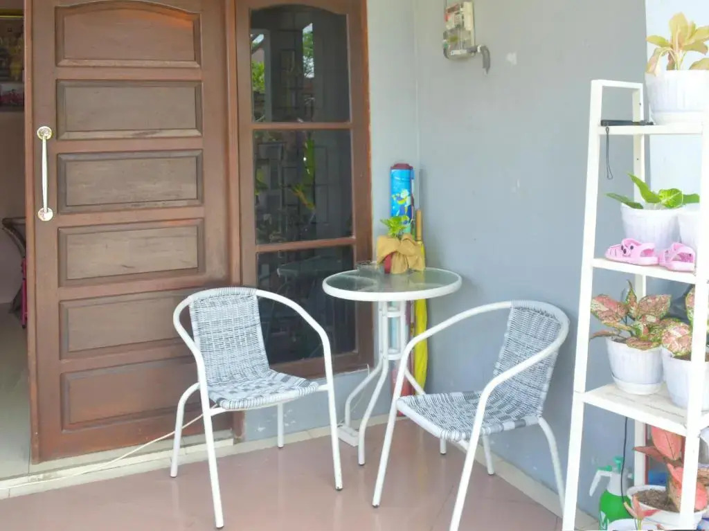 SPOT ON 91623 Pj Guest House Syariah