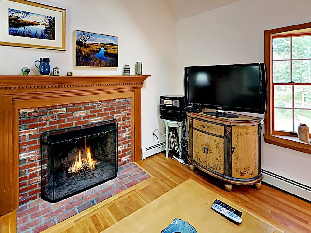 Woodsy Cape Cod Home by RedAwning