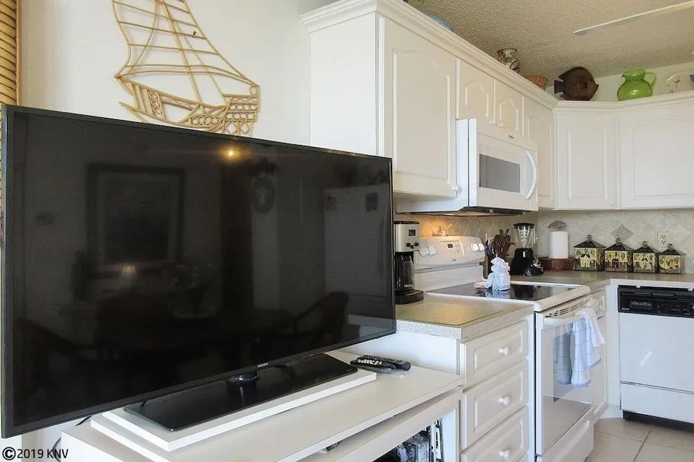 Estero Beach & Tennis #407A by RedAwning