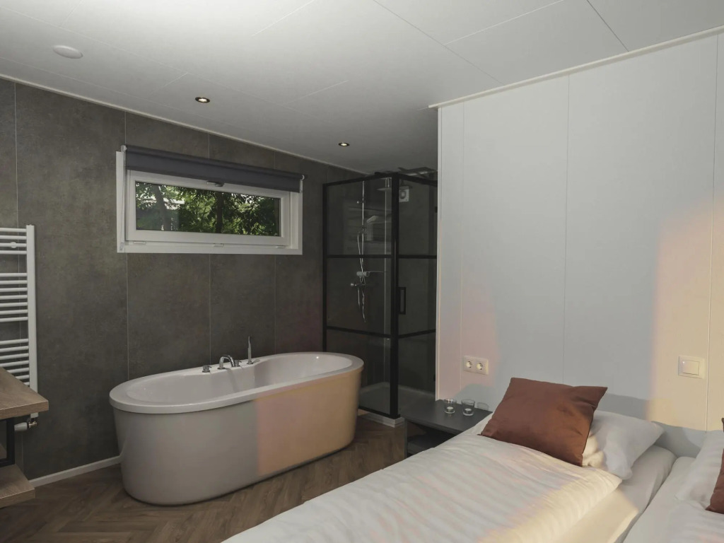 Wellness lodge, at a holiday park, with sauna and wonderful unobstructed view