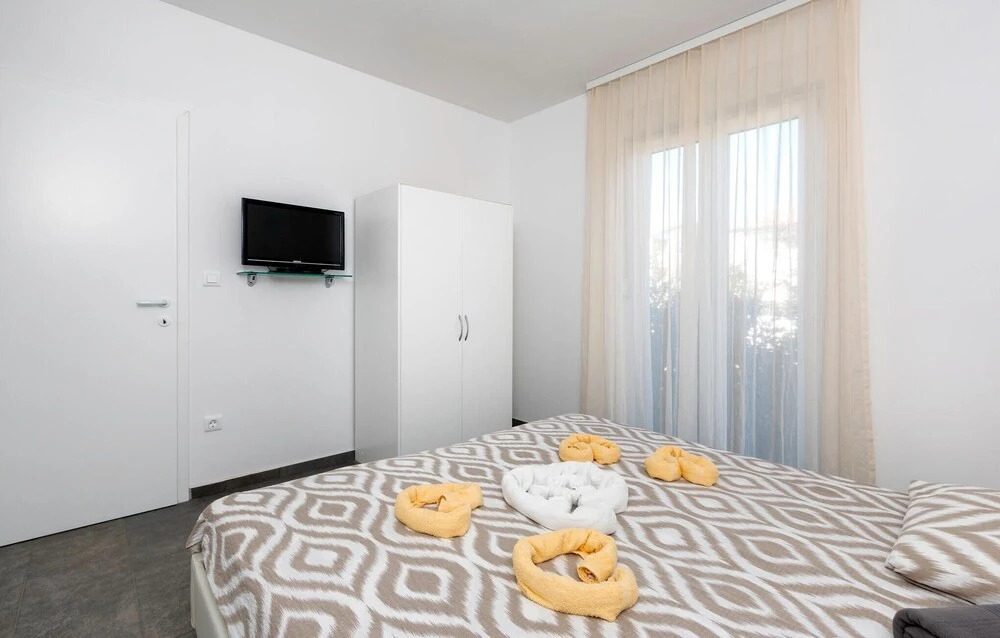 Amazing Home in Peroj With 4 Bedrooms, Wifi and Outdoor Swimming Pool