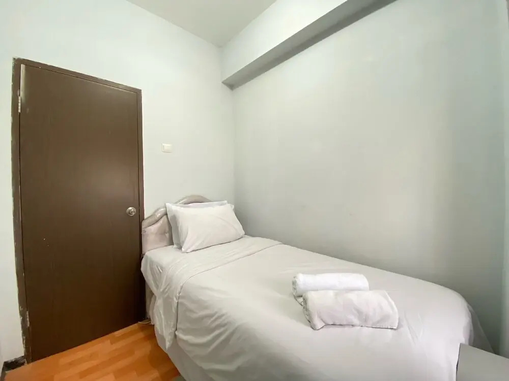Modern Designed 2BR at Suites @Metro Apartment By Travelio
