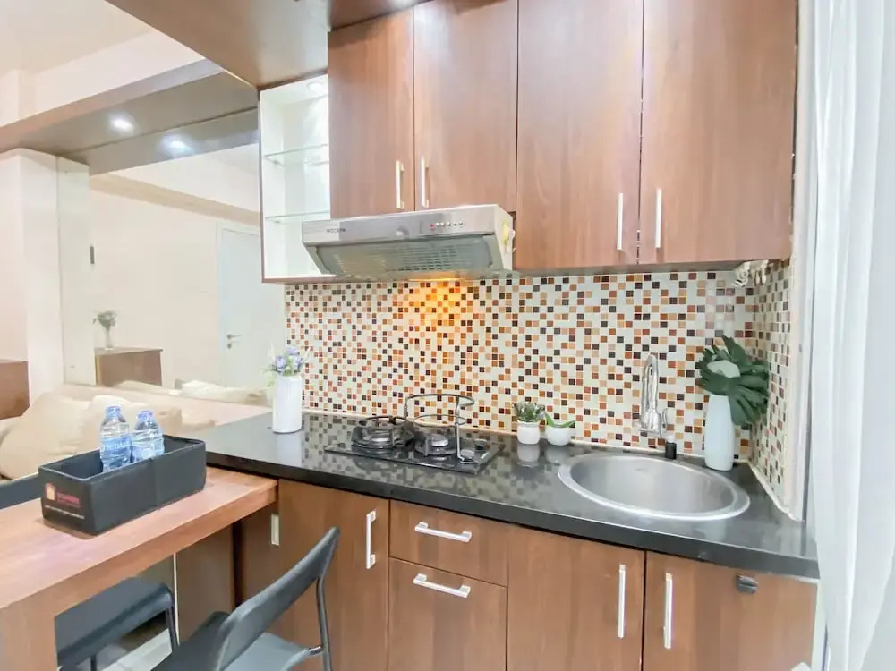 Comfy And Homey 2Br At Green Pramuka City Apartment
