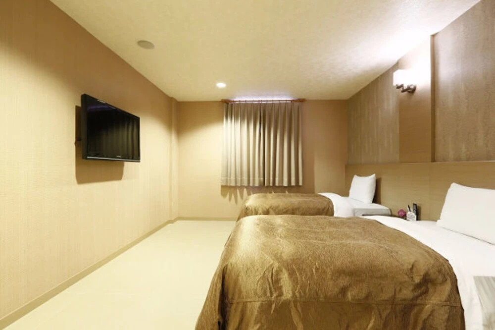 Huaxiang Motel - K Arena