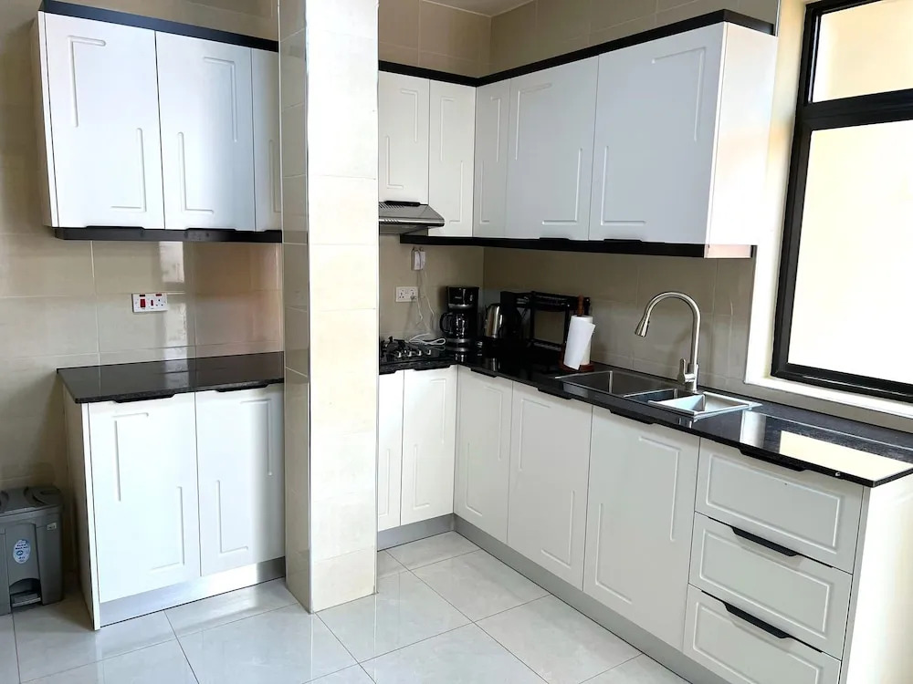 Q-Plus Apartments